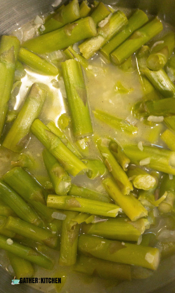 Asparagus stalks in the saucepan.
