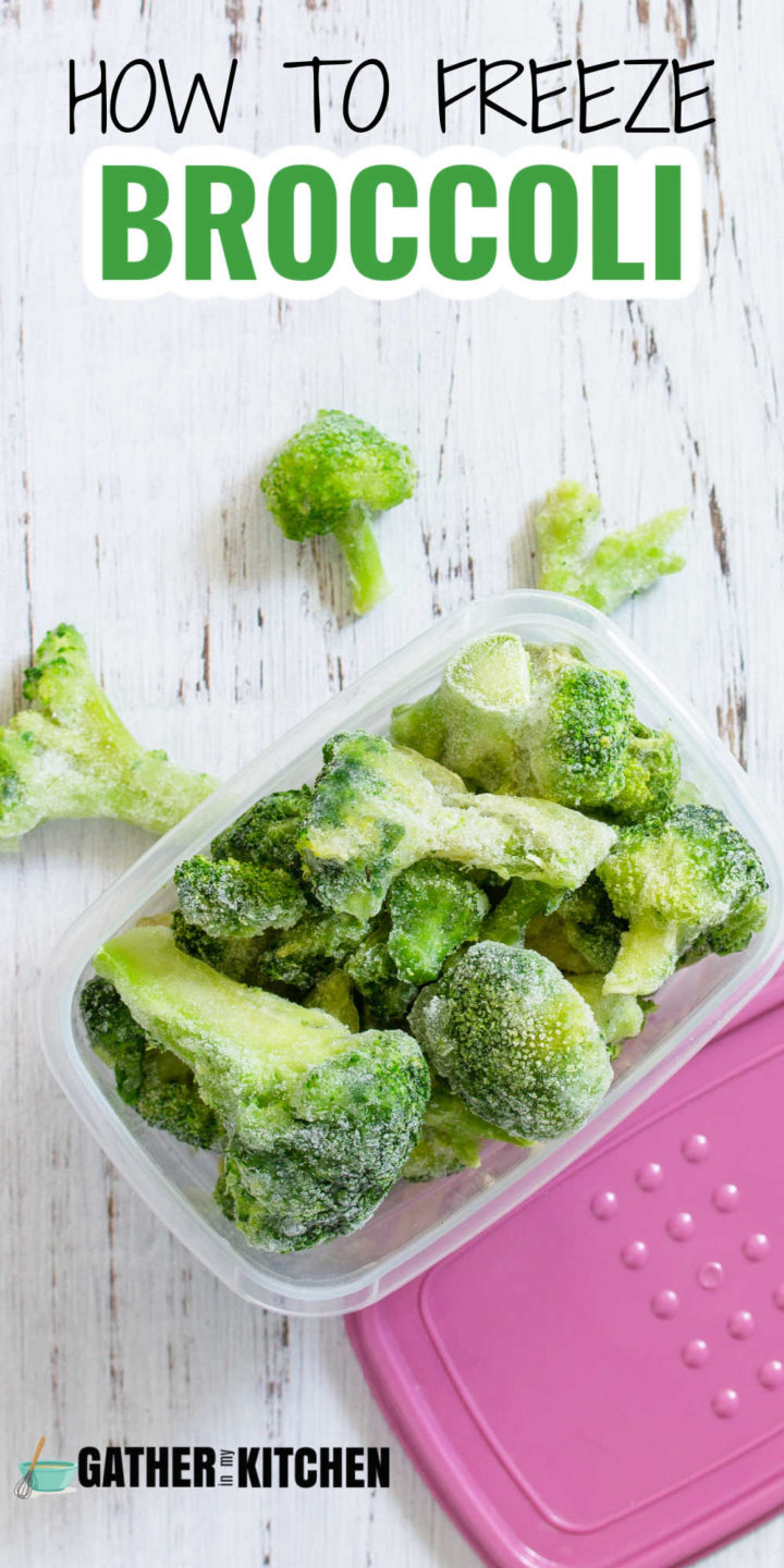 Frozen broccoli in a plastic container with the words "How to Freeze Broccoli".
