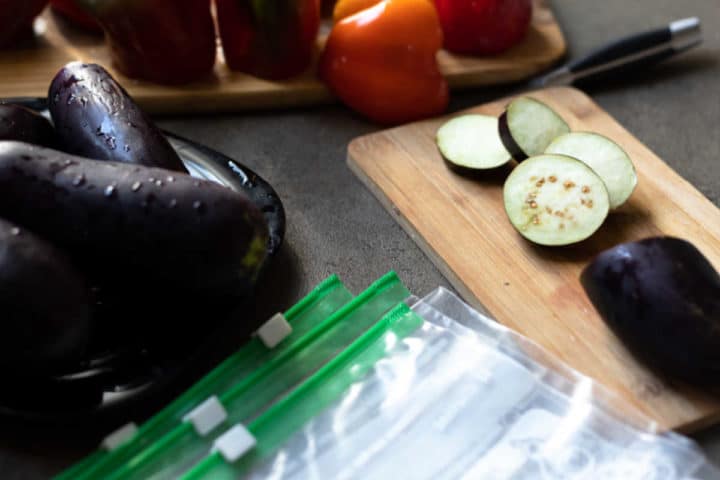 Eggplant on a cutting board sliced.