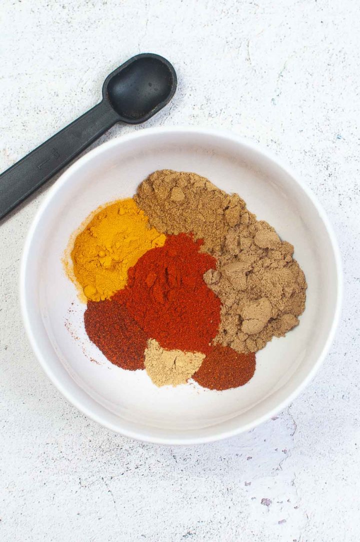 curry seasoning ingredients separated out in bowl.