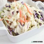 Coleslaw in a white dish.