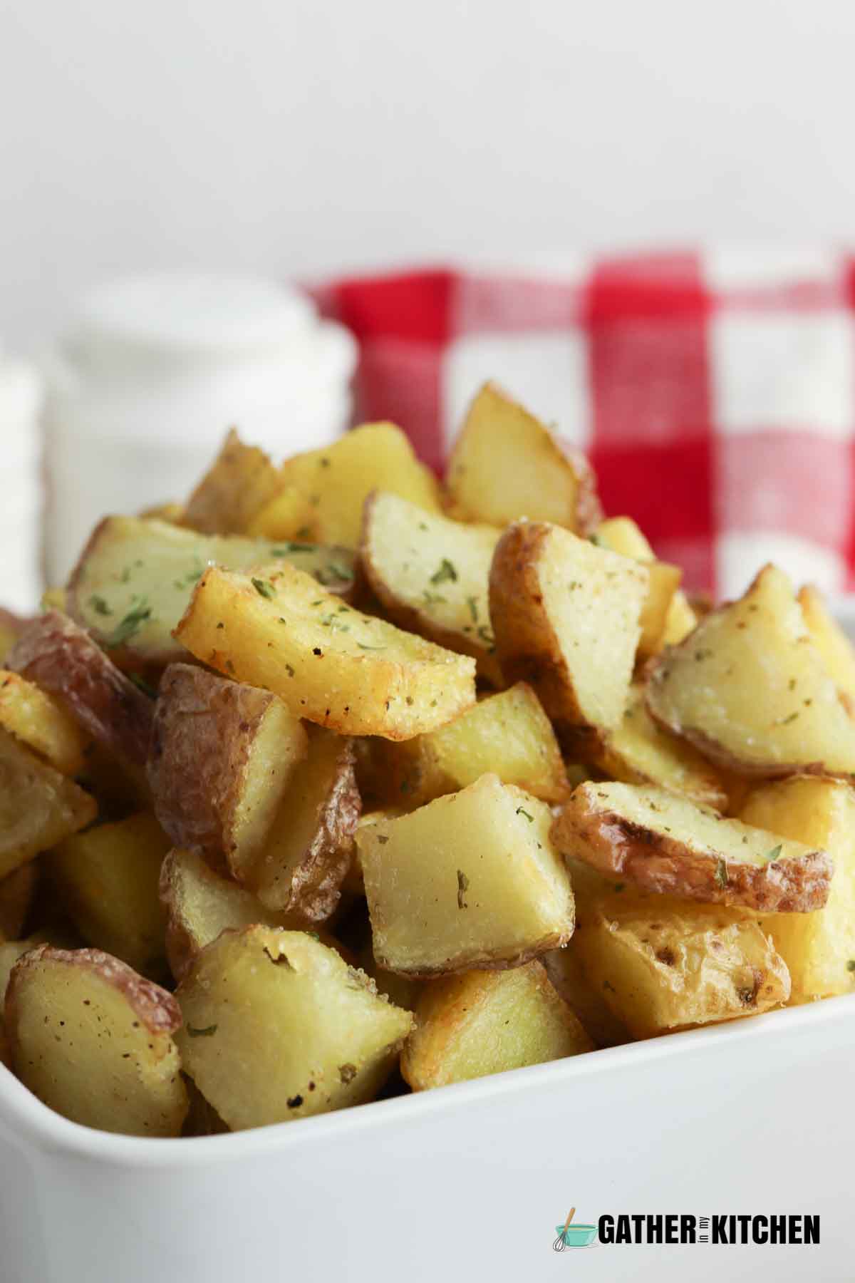 Closeup side view of fried potatoes.