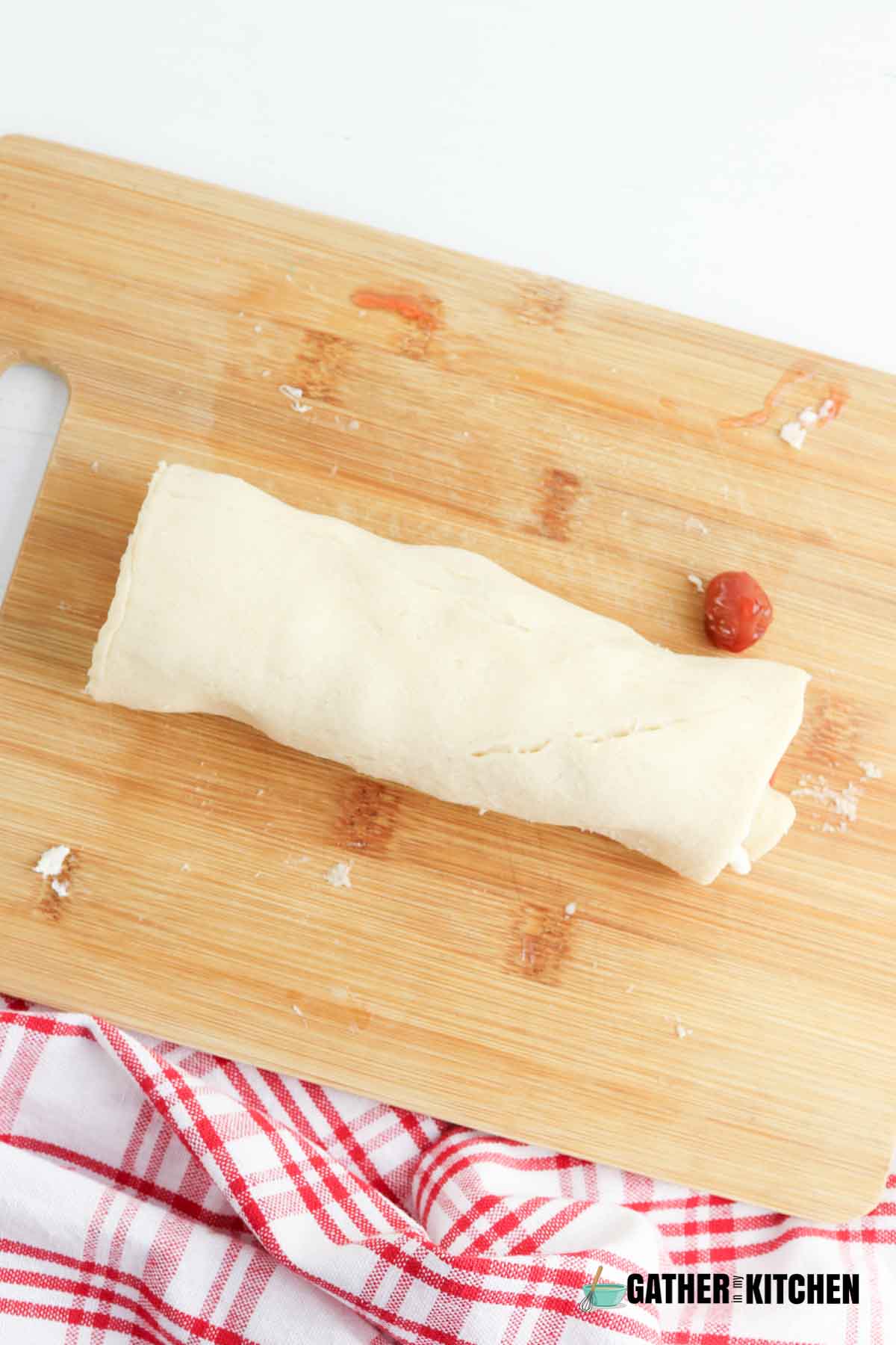 Rolled cup crescent dough.