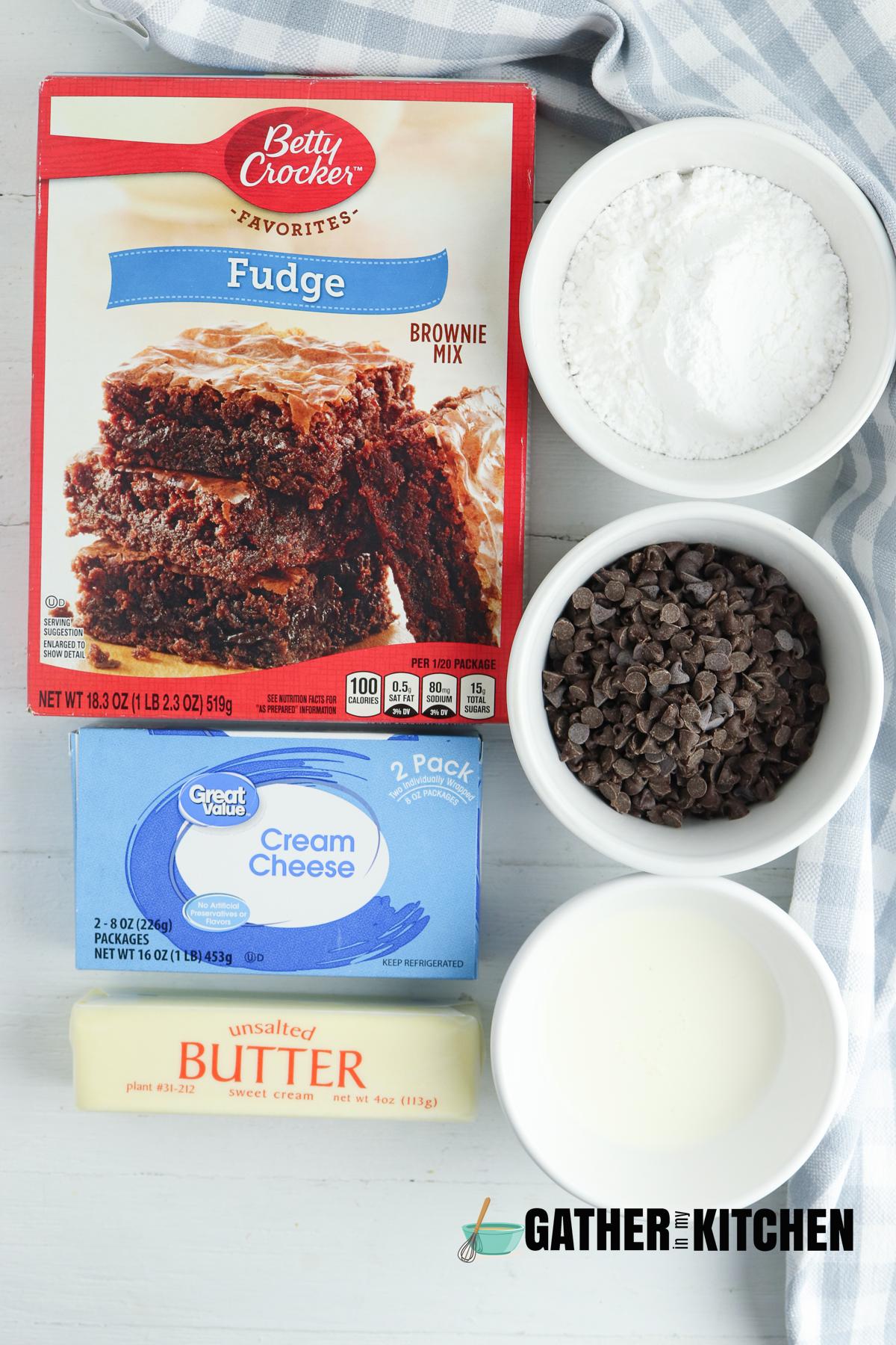 Ingredients: powdered sugar, mini chocolate chips, milk, butter, cream cheese, 
 and fudge brownie mix.