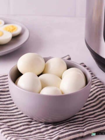 cooked hard boiled eggs in a bowl.