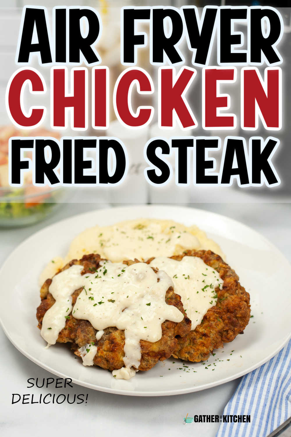 Pin image: chicken fried steak with gravy on a plate and "air fryer chicken fried steak" overlaid on top.