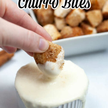 Pin image: top says "Air Fryer Churro Bites" on top of a pic of someone dipping an air fryer churro bite into cream cheese dip.