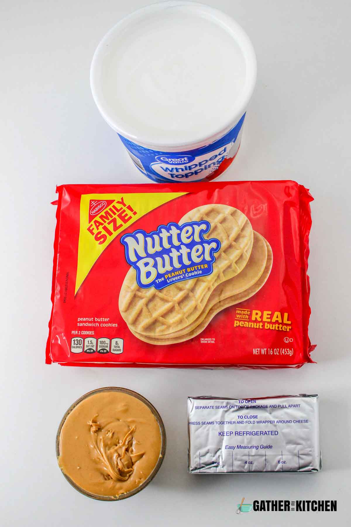 Ingredients for making peanut butter ice box cake: whipped topping, Nutter Butters, peanut butter and cream cheese.
