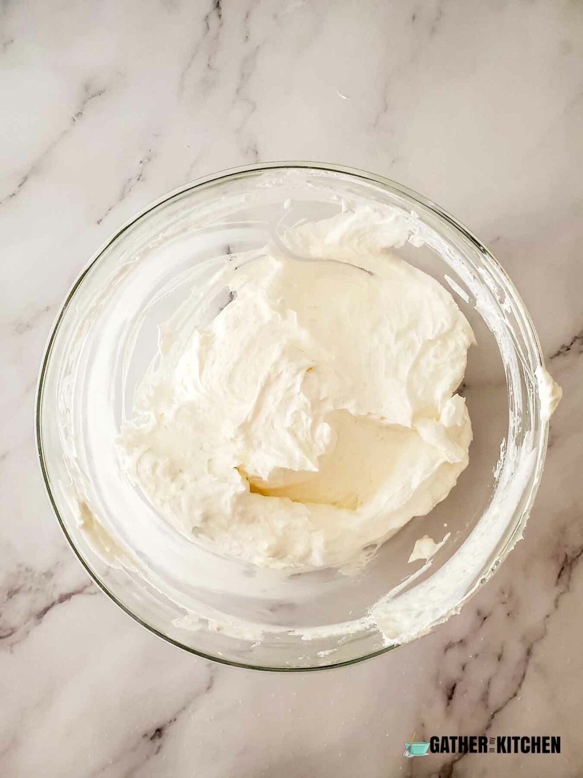 Whipped topping stirred into cream cheese mixture.