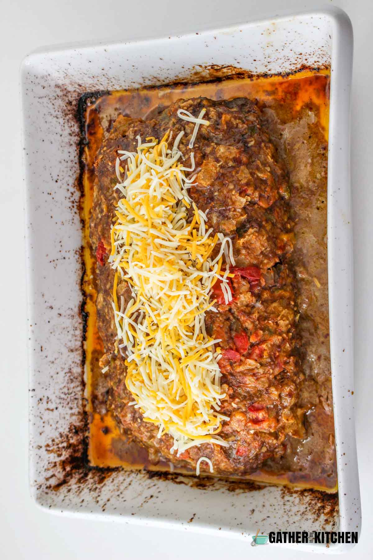 Cheese added to cooked meatloaf.
