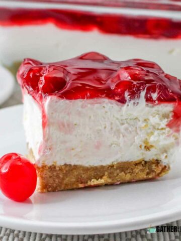 Piece of cherry delight on a plate.