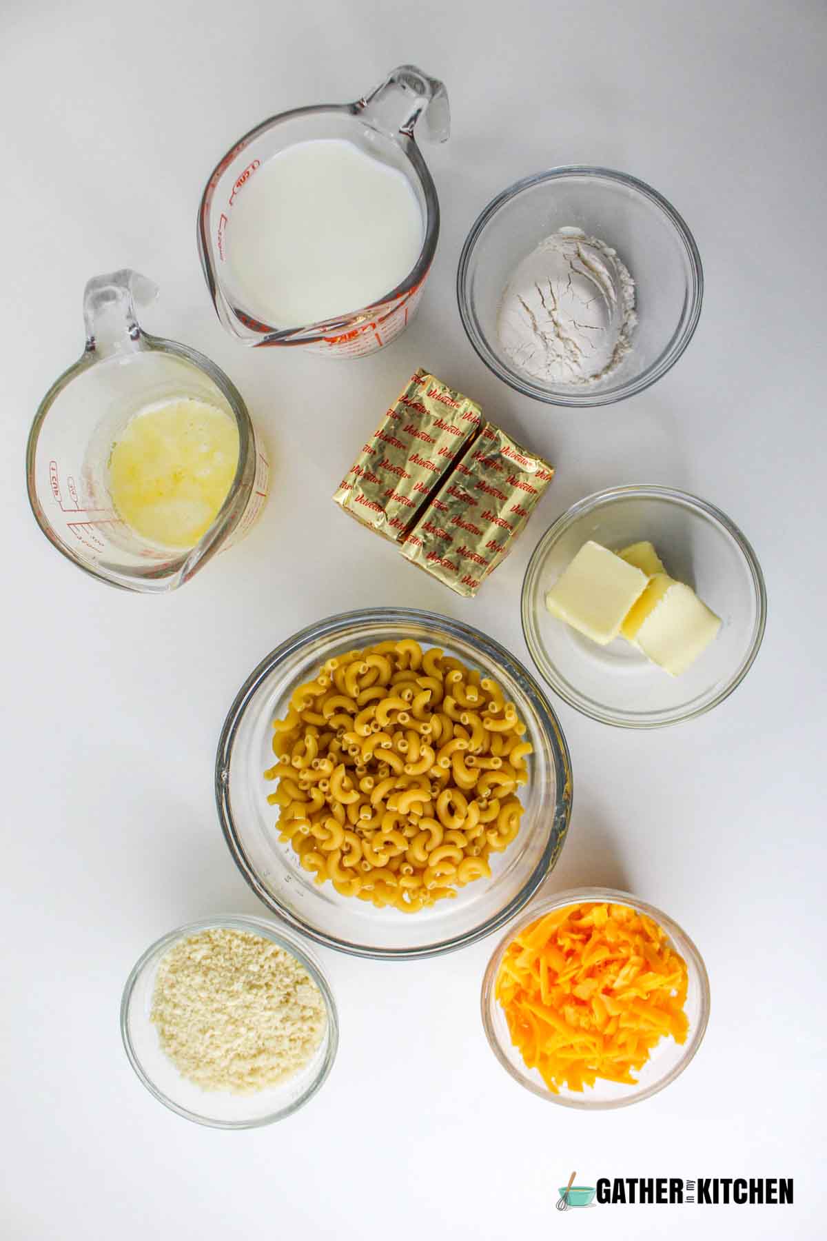 ingredients: macaroni, butter, flour, milk, velveeta, cheddar cheese, bread crumbs.
