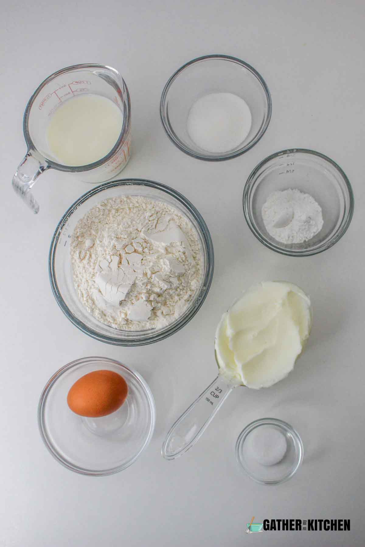 Ingredients: flour, baking powder, salt, sugar, shortening, and milk.