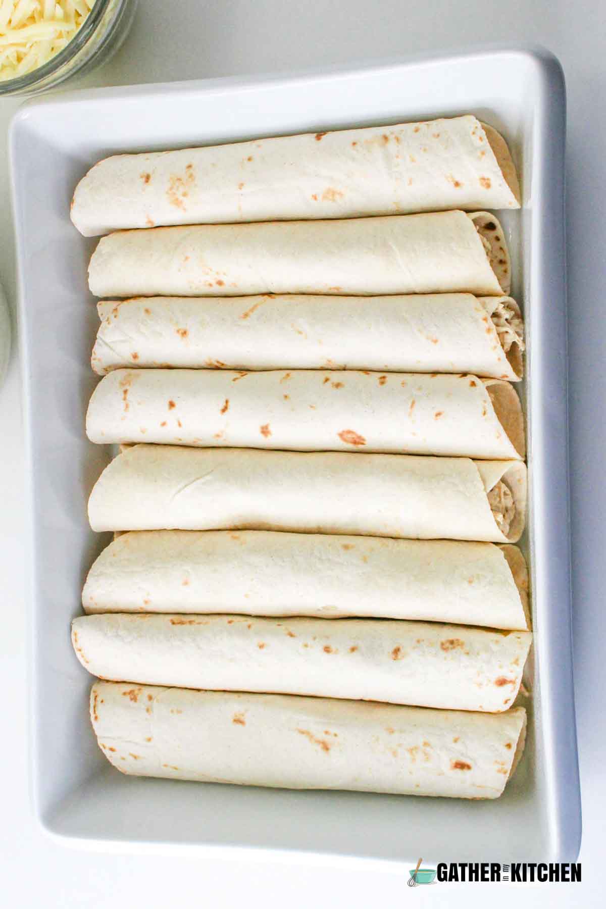 A tray of rolled enchiladas.