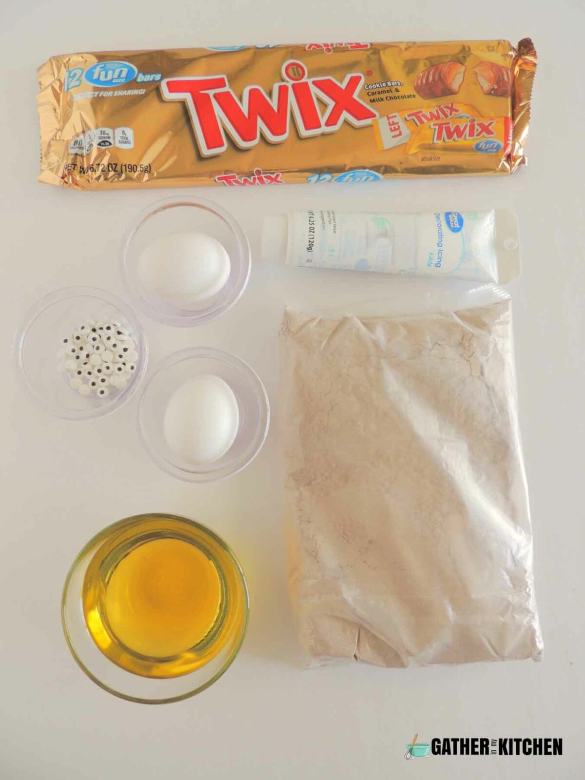 Ingredients: package of Twix, white decorating icing, brownie mix, oil, eggs, edible googly eyes