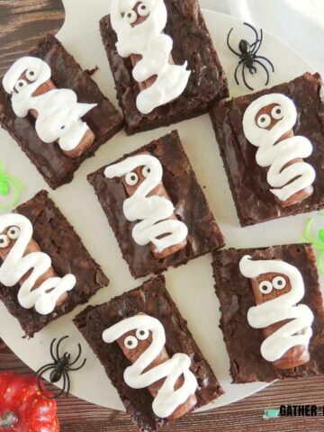 A plate of Halloween mummy brownies.