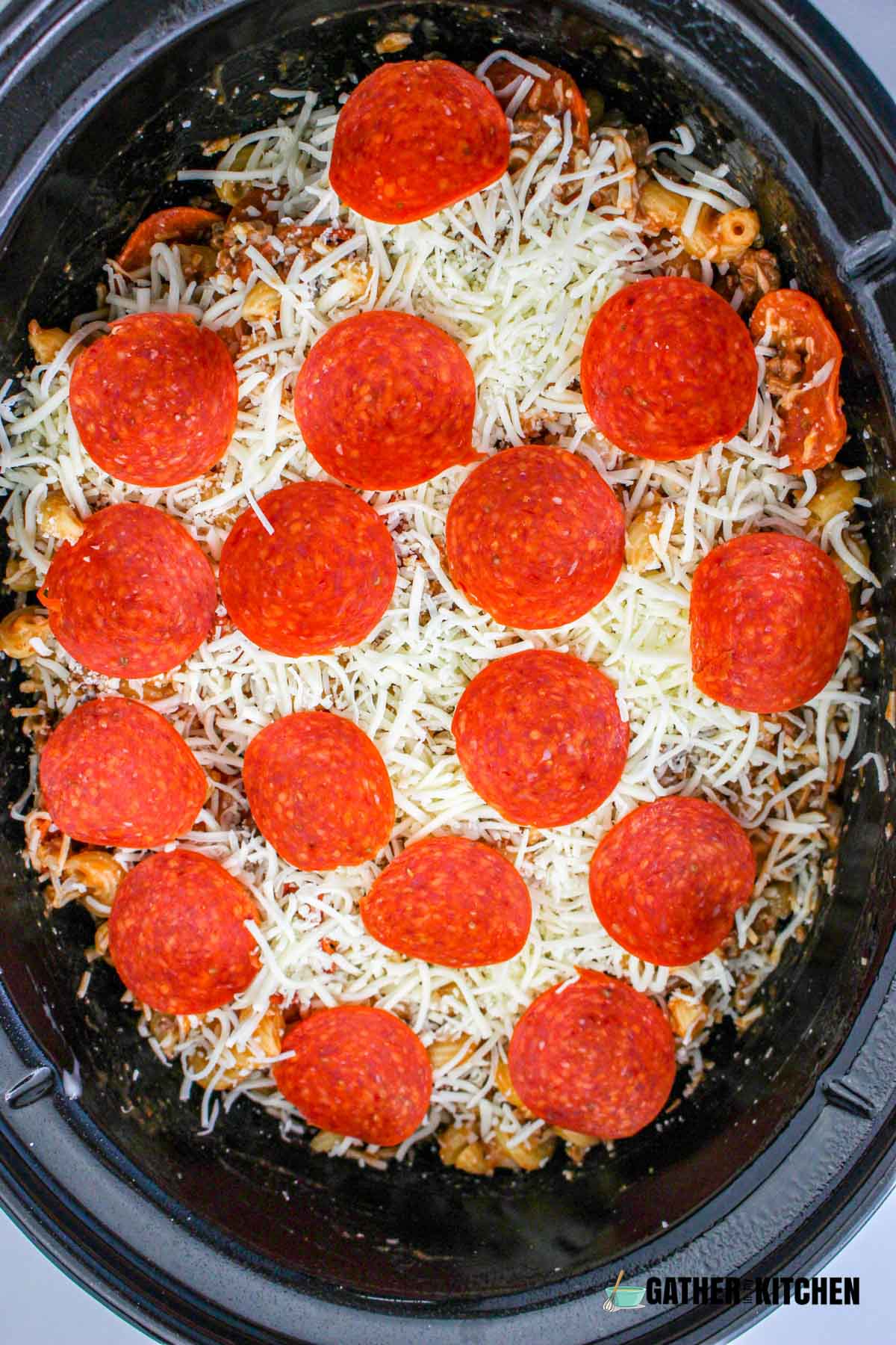 Pizza casserole topped with pepperoni.