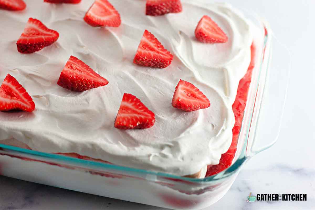 A closeup of strawberry ice cream cake.