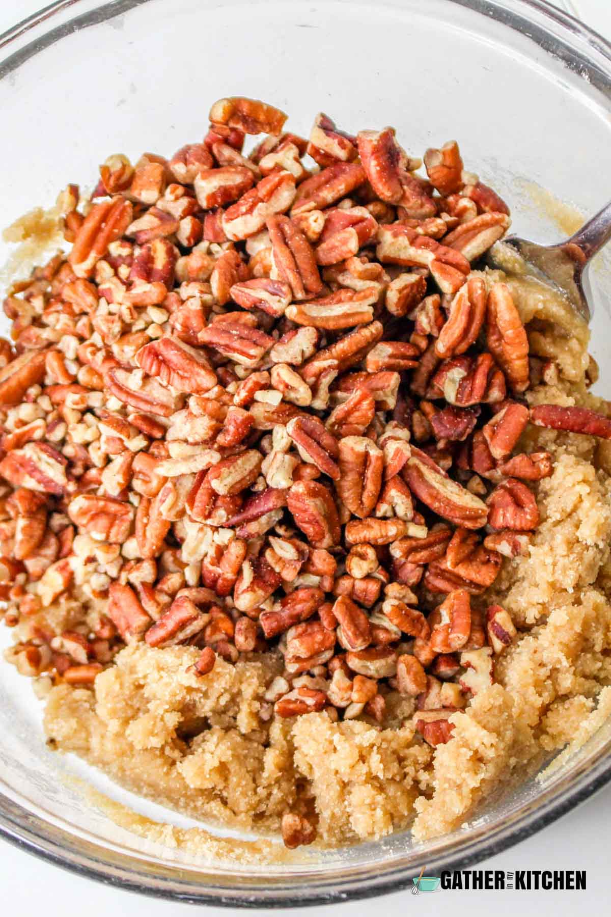 Casserole mixture topped with pecans.