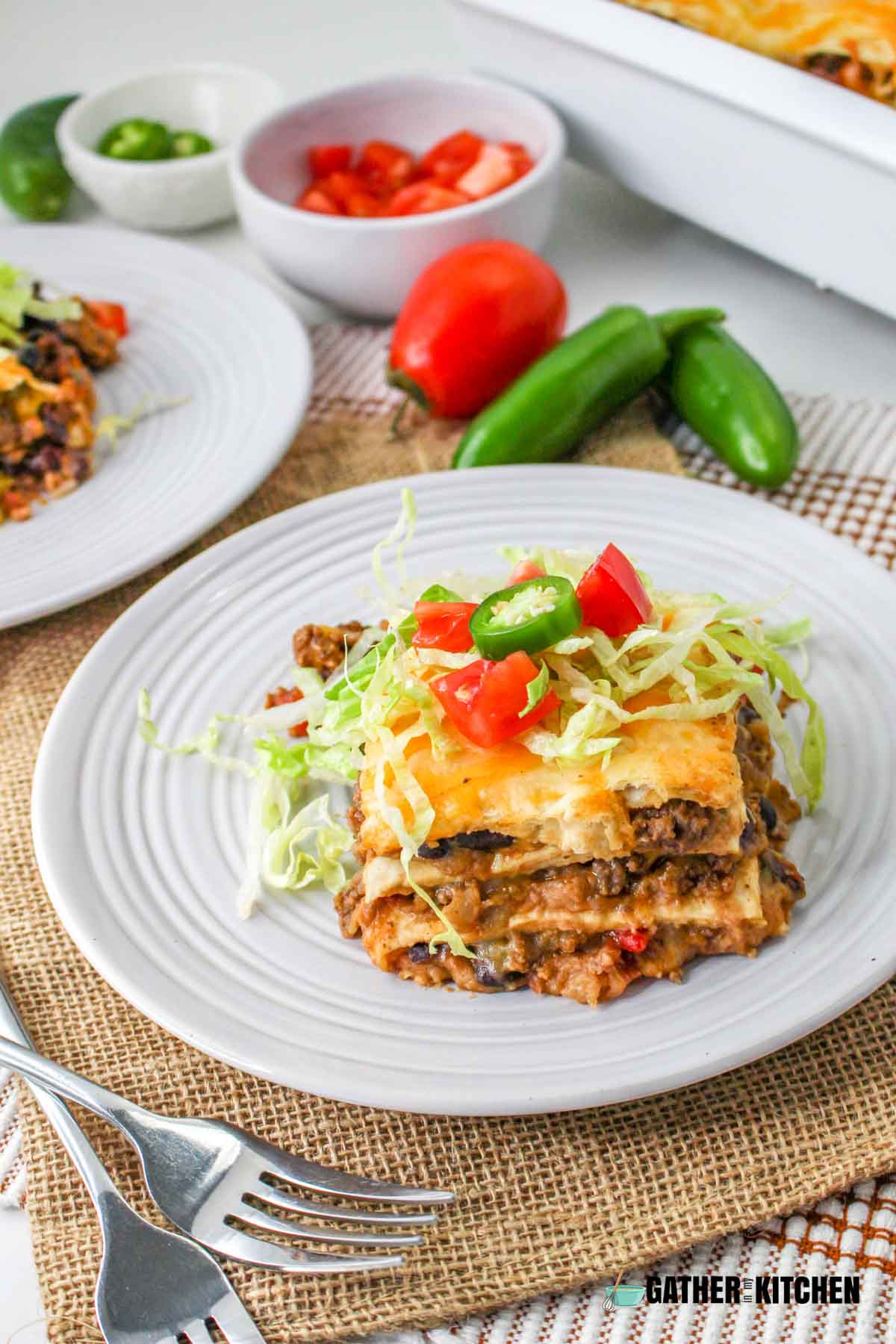 A slice of taco lasagna on a plate.
