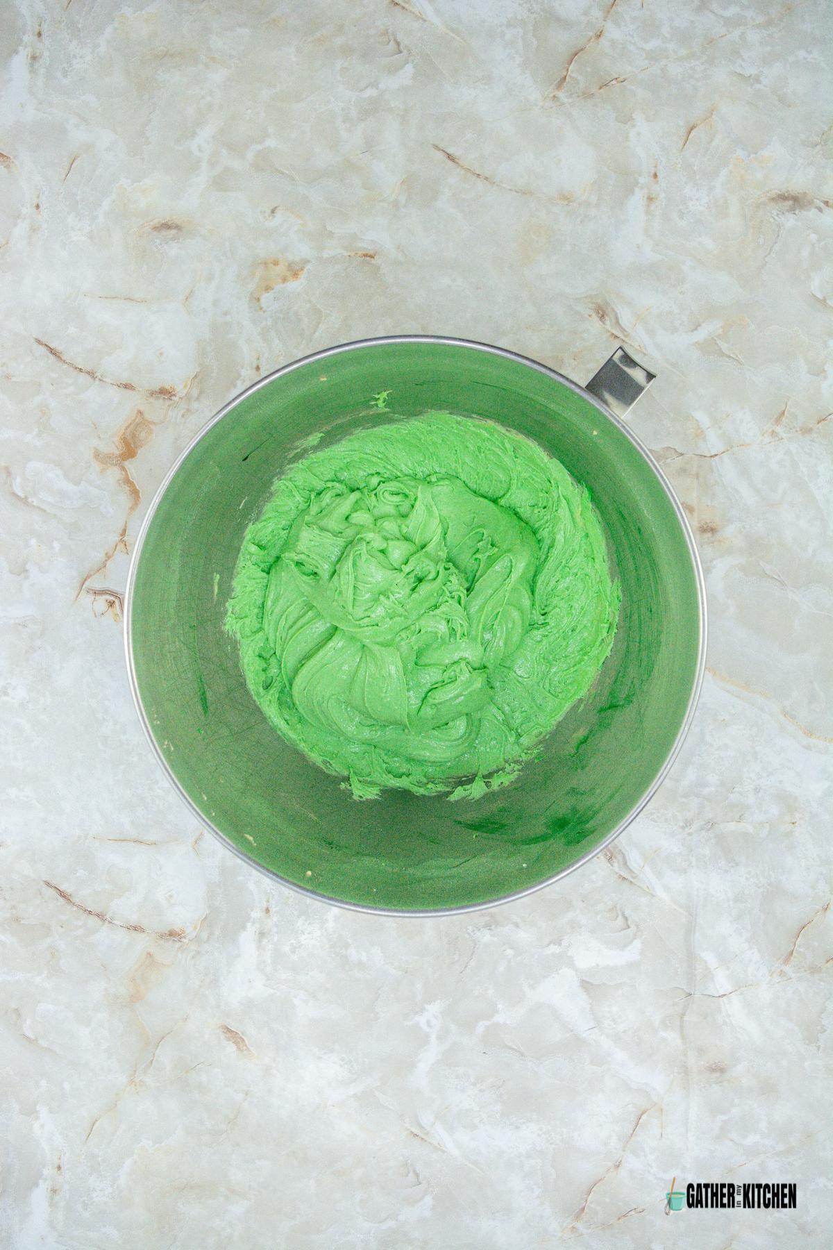 Cake mixture with green food coloring.