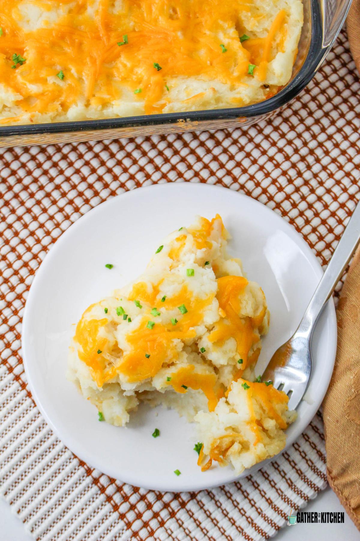 Top view of a plate of mashed potato casserole.