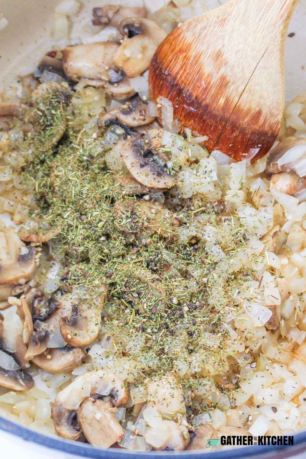 Garlic, mushrooms and thyme added to pan.