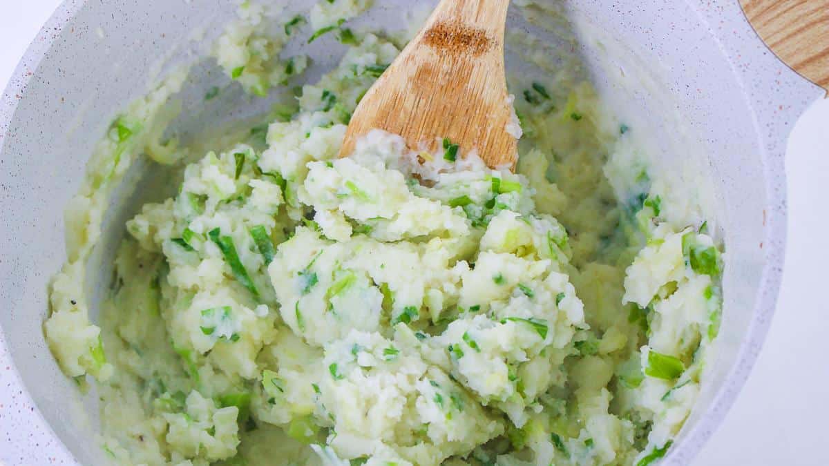 Colcannon potatoes in pan, all mixed up.