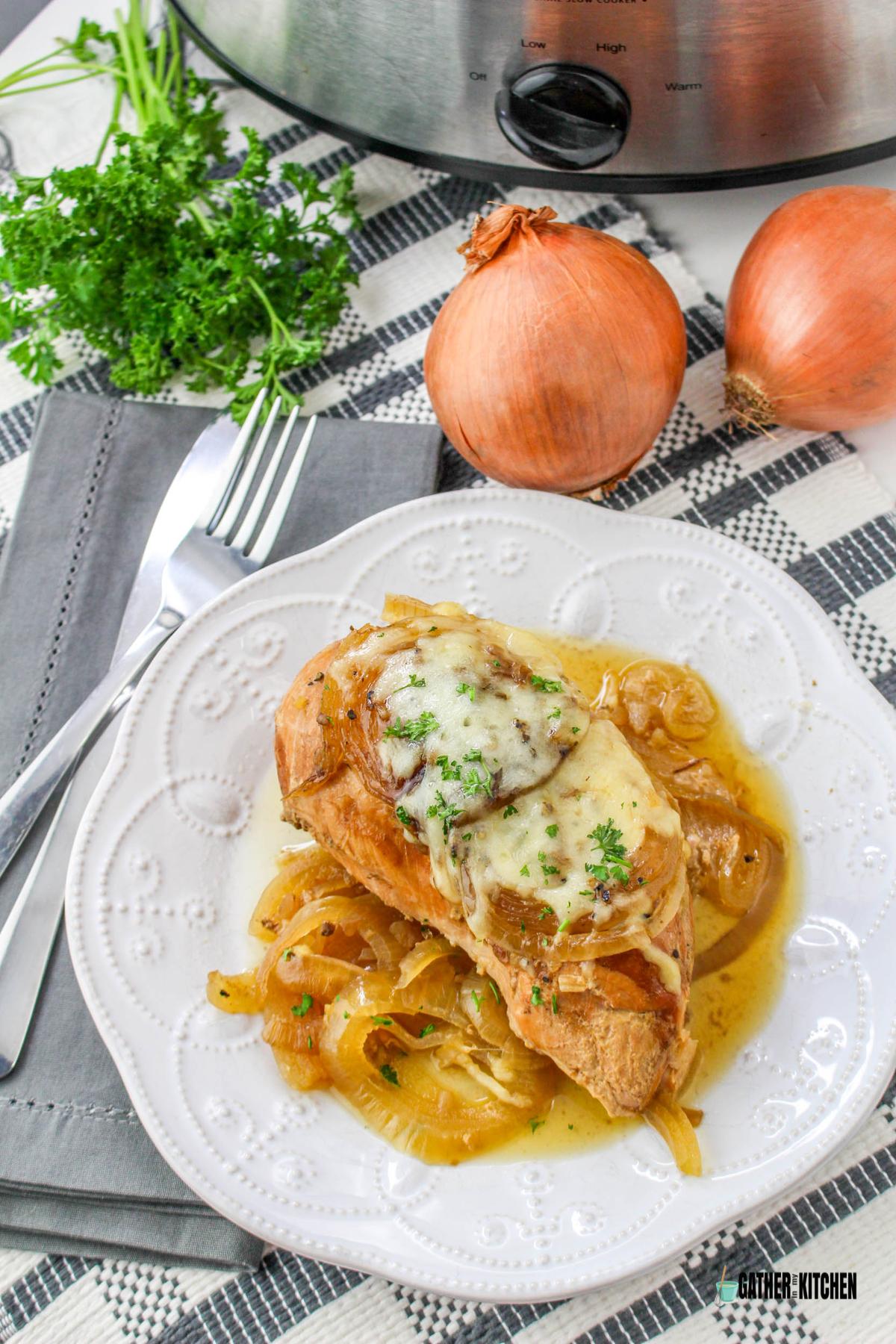 French onion chicken on a plate.