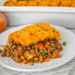 Shepherds pie with tater tot topping on a plate.