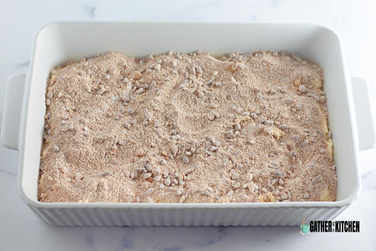 Baking pan with the sugar/pecan mixture sprinkled over the cake batter.
