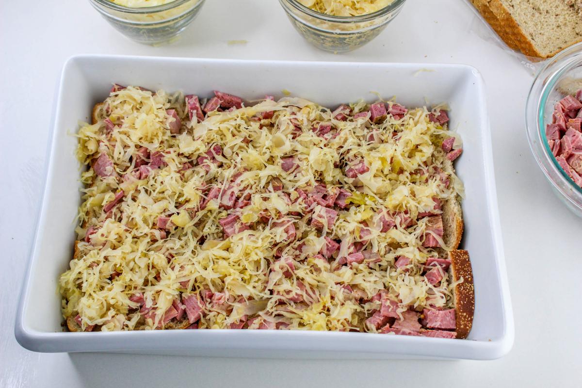 Swiss cheese on top of corned beef layer.