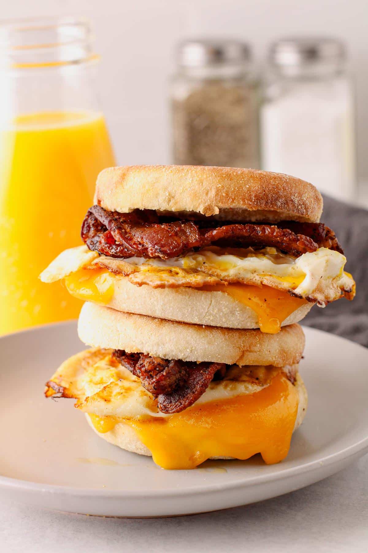 Two breakfast sandwiches stacked on top of each other.