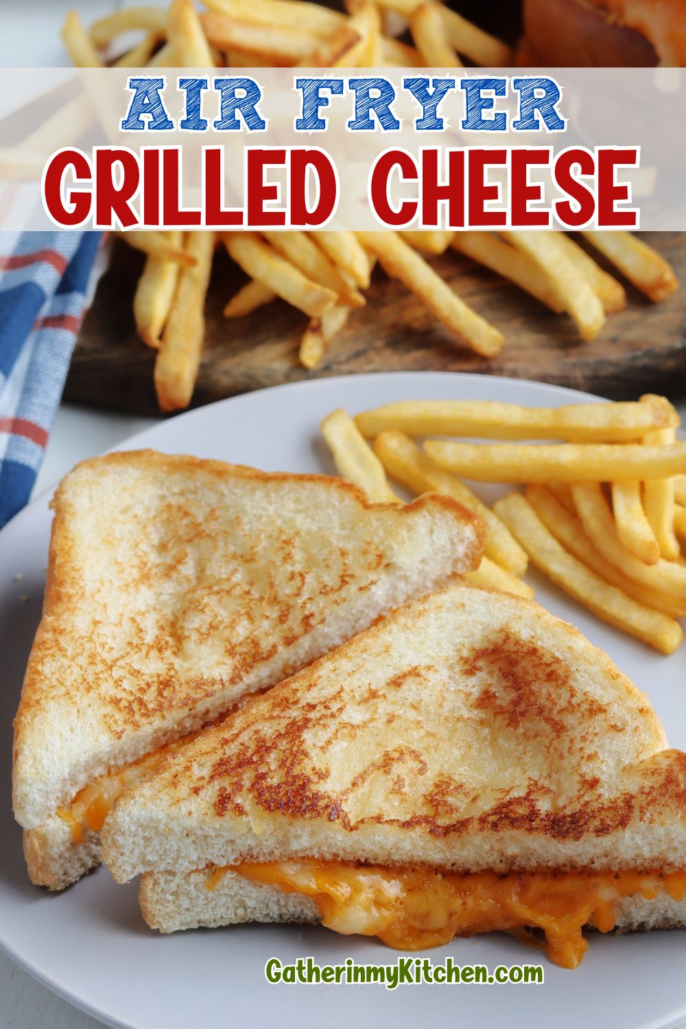 Pin image: plate with a cut in half grilled cheese sandwich with the words "Air Fryer Grilled Cheese" overlaid on top.
