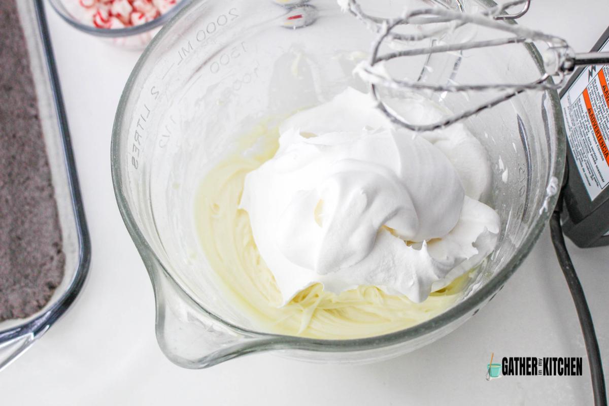 Whipped topping added to cream cheese mix.