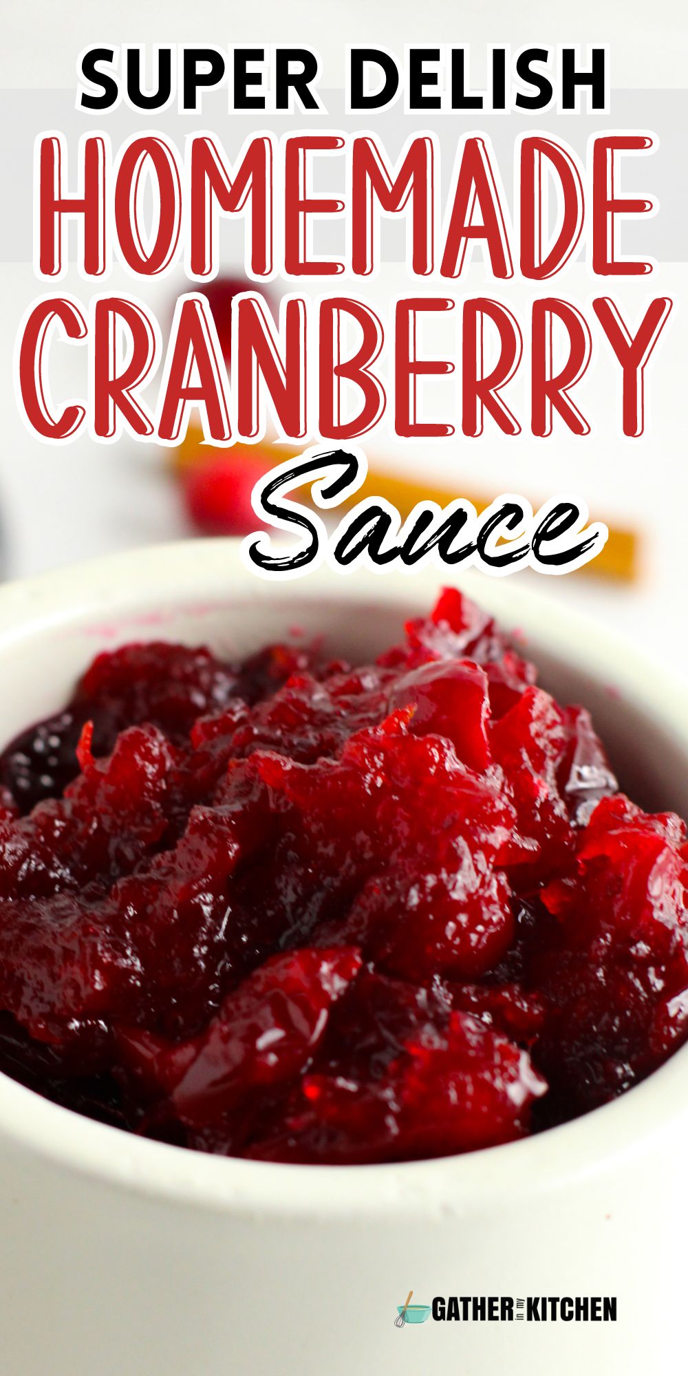 Pin image: top says "Super Delish Homemade Cranberry Sauce" and it's overlaid over a closeup image of cranberry sauce in a white bowl.